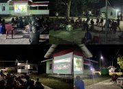 Nonton Bareng “Bakti Memanggil di Kota Injil”, Warga dan Satgas TMMD Ke-128 Saksikan Kiprah Kodim 1801/Manokwari